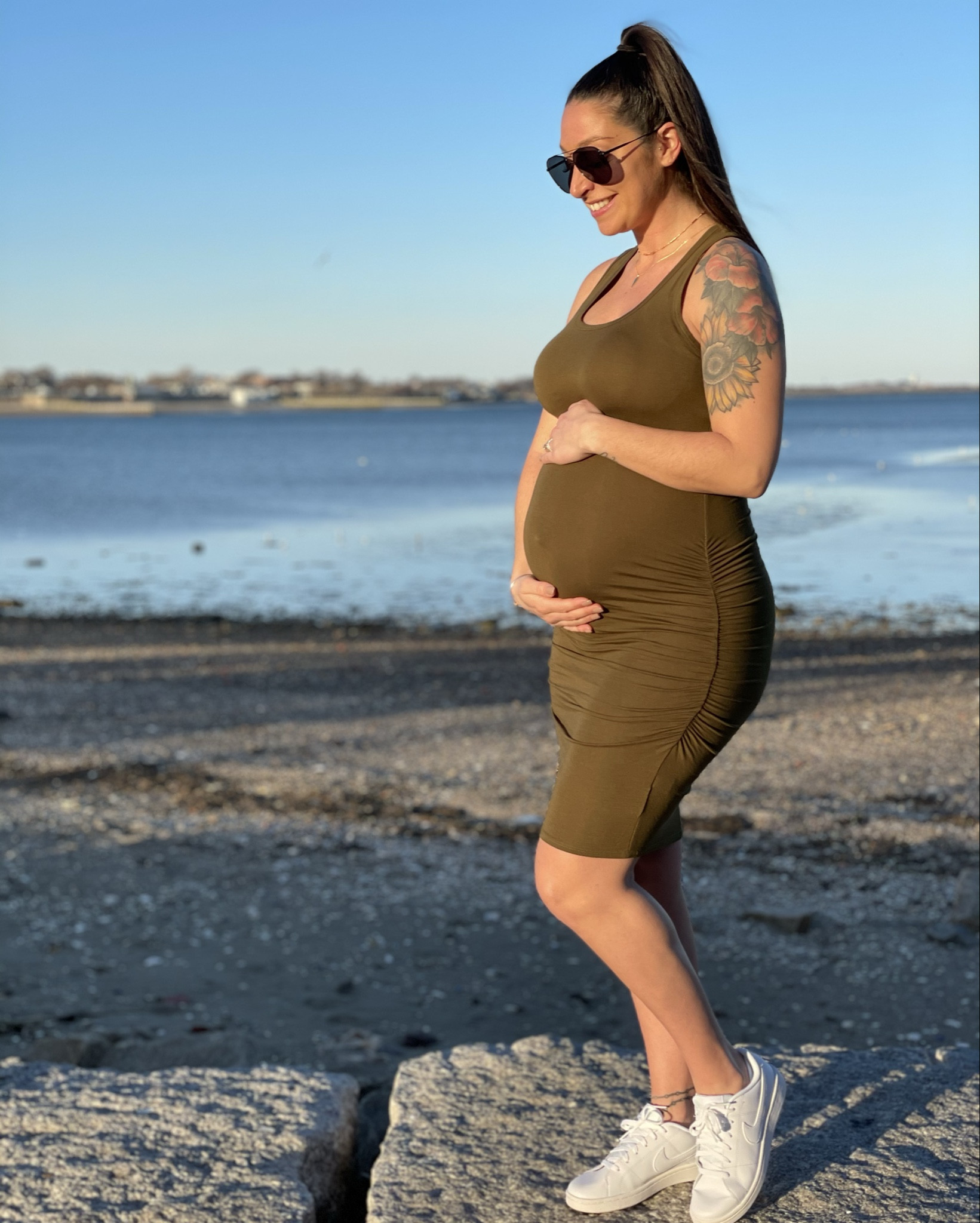 Stretchy bodycon dress perfect for maternity! I’m wearing a small! 