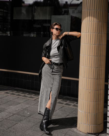 Grey denim skirt styled with an oversized leather jacket and western boots. 

#LTKstyletip