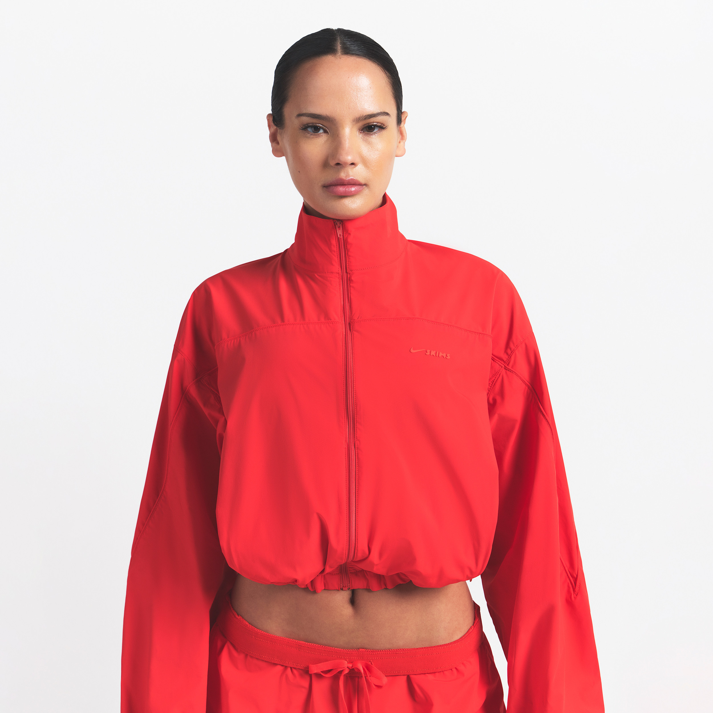 Nike Women's SKIMS Woven Nylon Crop Jacket in Red | TPZUP3561-RBY | Nike (US)