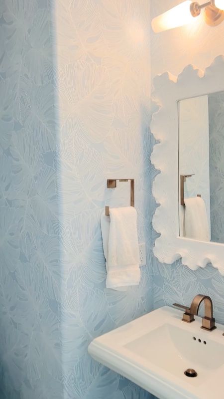 Coastal bathroom wallpaper. Modern coastal home decor. Powder room decor. 

#LTKhome #LTKstyletip #LTKVideo