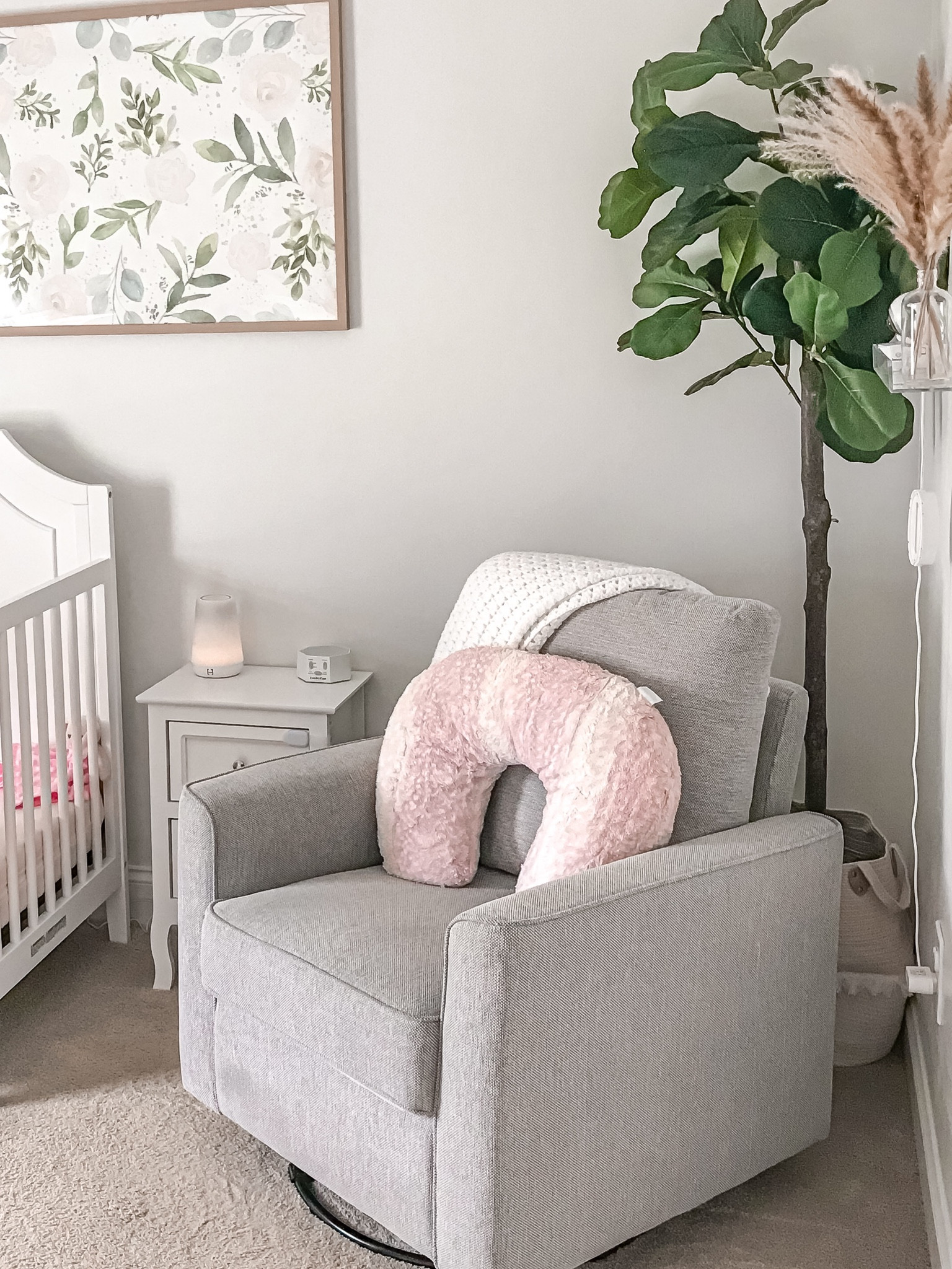 The wall to the right of the chair is where the fourth floating shelf is hung housing her sleep monitor and the dried pompous grass for decor. I’ve also linked the basket the fiddle leaf fig tree is sitting in. 
#neutralnursery #earthtonesnursery #babygirlnursery #minimalistnursery #fiddleleaftree #pompousgrass #clearfloatingshelves #nursery

#LTKfamily #LTKhome #LTKbaby