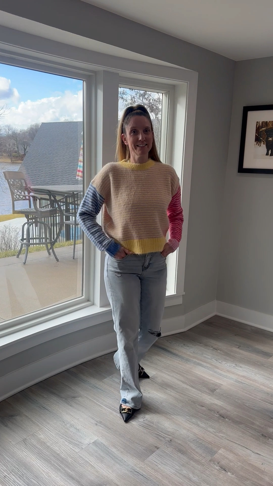 Mismatched sleeves and sunshine vibes. ☀️💙 Loving this vibrant striped moment for a day at home. Snag the links for this entire look at the link in my bio! ✨ #OOTD #StripedStyle #ShopTheLook

Color-blocked sweater, striped knit, mismatched sleeves, yellow and tan stripes, pink and blue accents, light-wash jeans, distressed wide-leg denim, Weatherby Lake style, winter fashion 2026, playful casual wear, vibrant knits, WFH outfit inspiration, LTKfind, cheerful aesthetic

#LTKSeasonal #LTKootd #LTKOver40