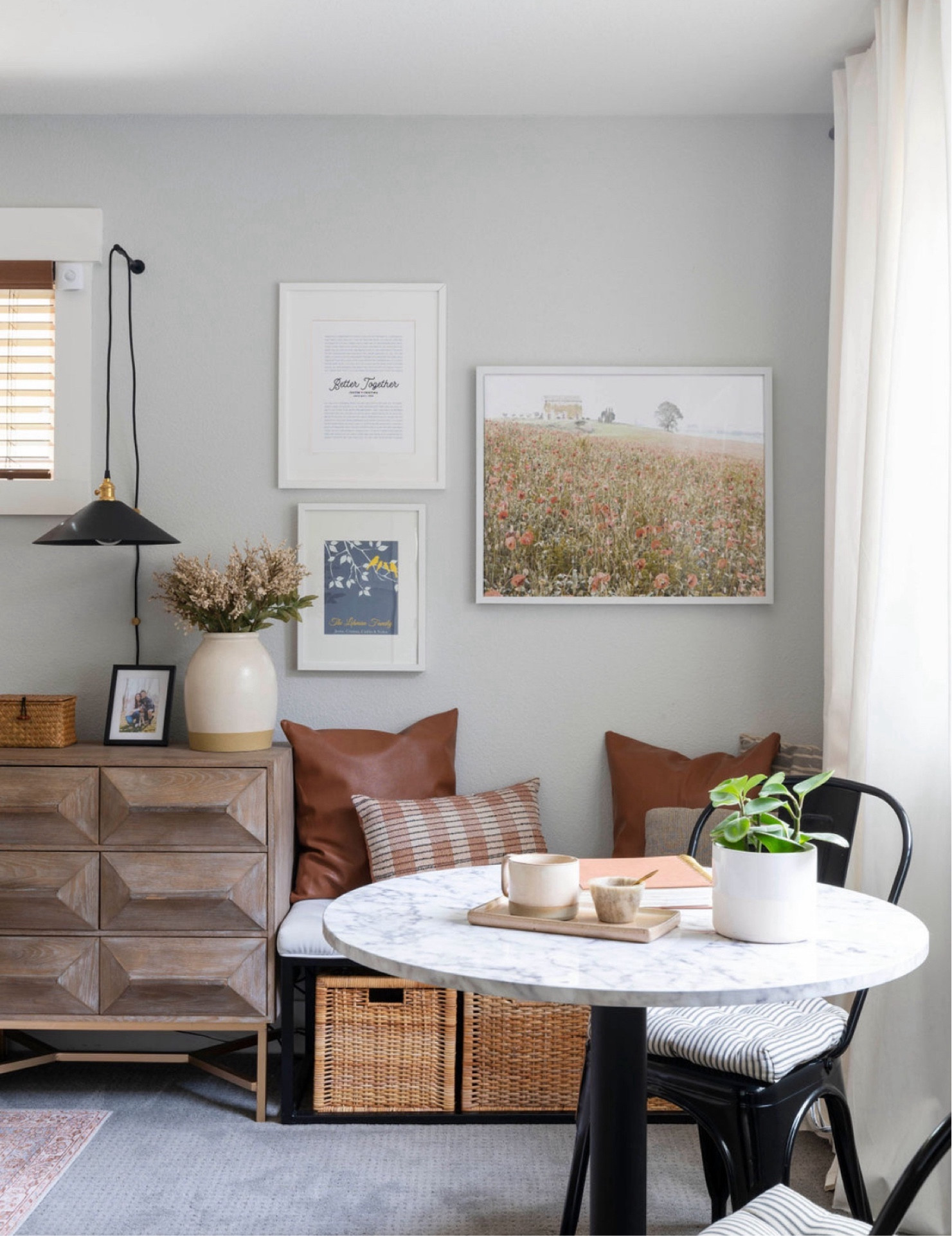 Love having a little bistro table in our bedroom for morning coffee and planning out my day. This table by Nathan James has a faux marble top and is the perfect size. The bench with pillows in the corner completes this cozy nook.

#LTKhome #LTKfamily