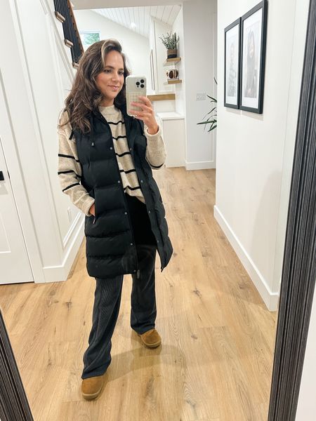 The ultimate comfy cozy fall outfit, long puffy vest, ribbed flared leggings, mini ugh dupes

#LTKSeasonal #LTKfindsunder50 #LTKfindsunder100