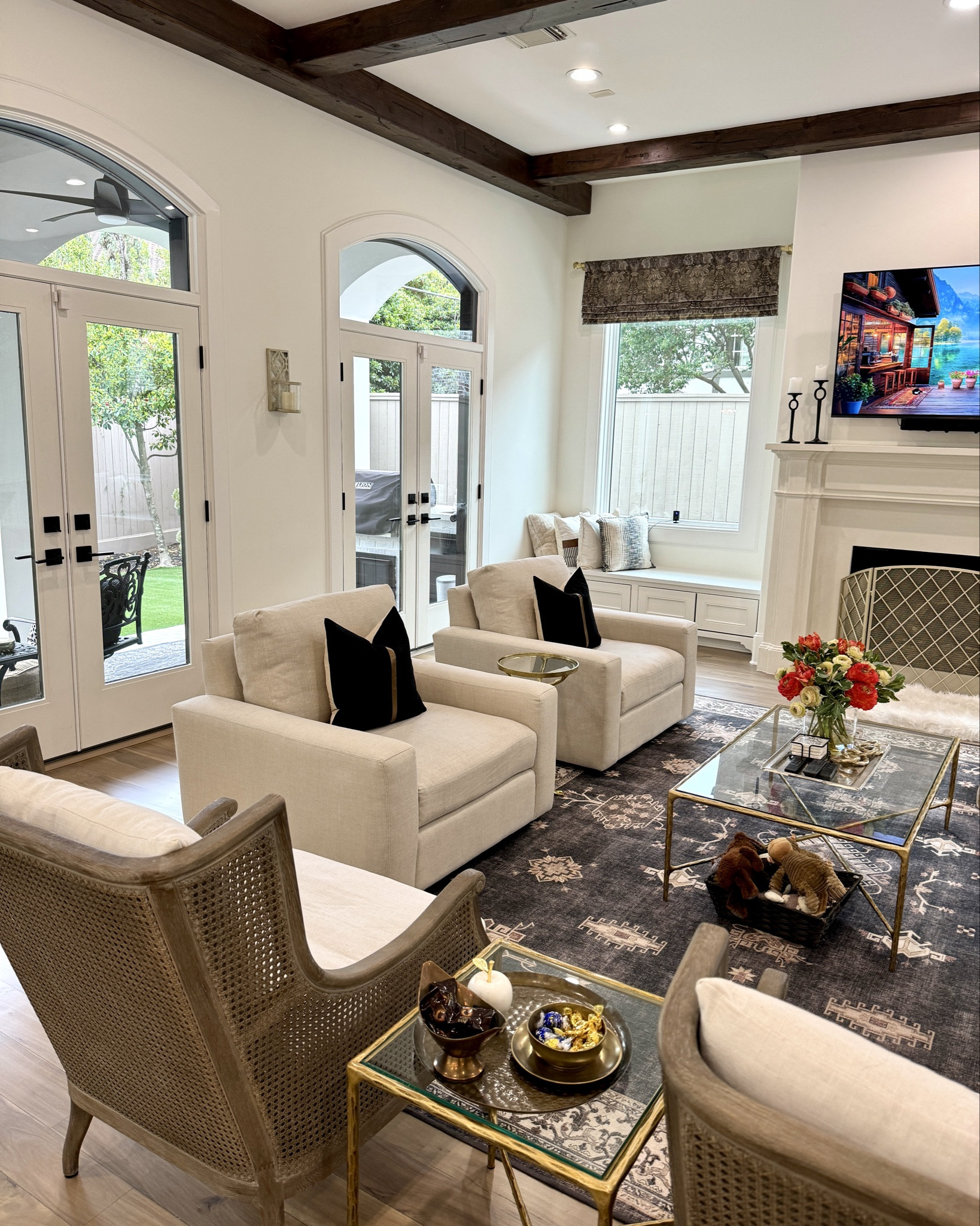 Living room, furniture and decor.

#everypiecefits

Home decor 
Home furniture 
Sofa 
Cane back chair 
Den furniture 
Area rug 
Interior design