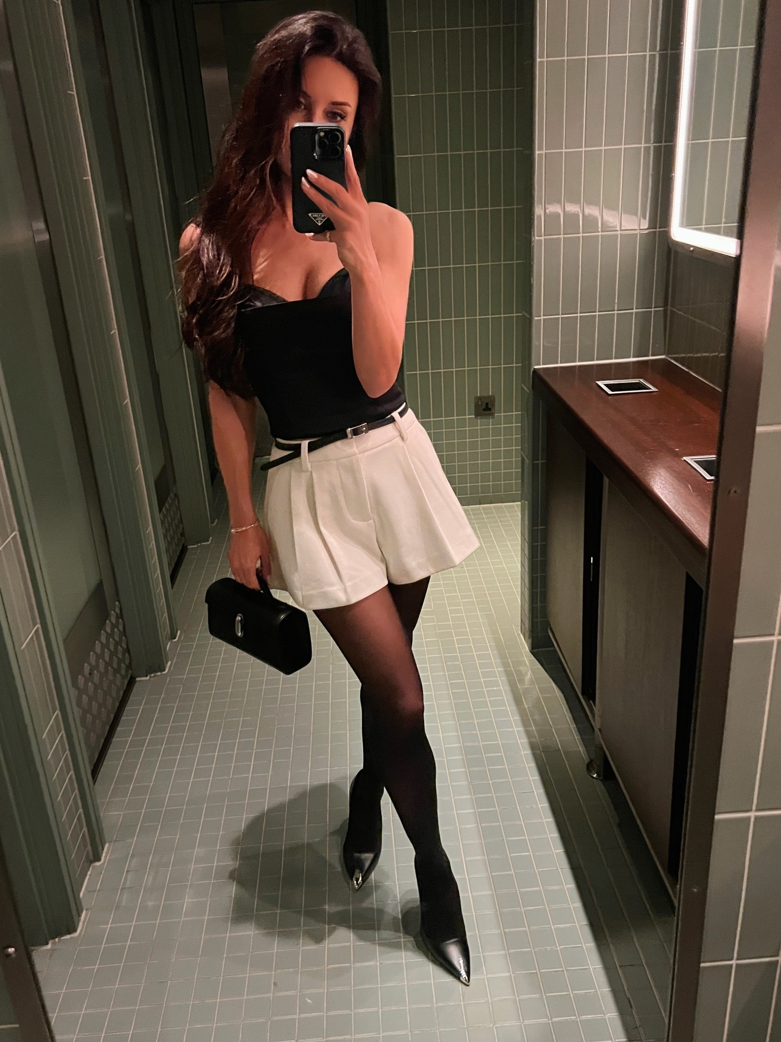 What I wore for a night out in London, I’m obsessed with this #🖤datenight top. I own it in two colors and wear a size 2 . I’ve been reaching for these white shorts lately (wearing an XS) and I highly recommend these tights as they don’t run very easily and the quality is amazing.

#LTKParties #LTKStyleTip #LTKOver40