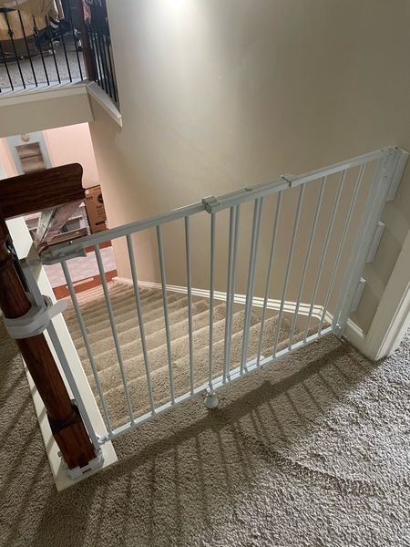 Took us forever to decide on a baby gate for the top stairs because we needed one that attaches to the banister and the wall. This is the one we chose. 

#LTKfamily #LTKbaby #LTKkids