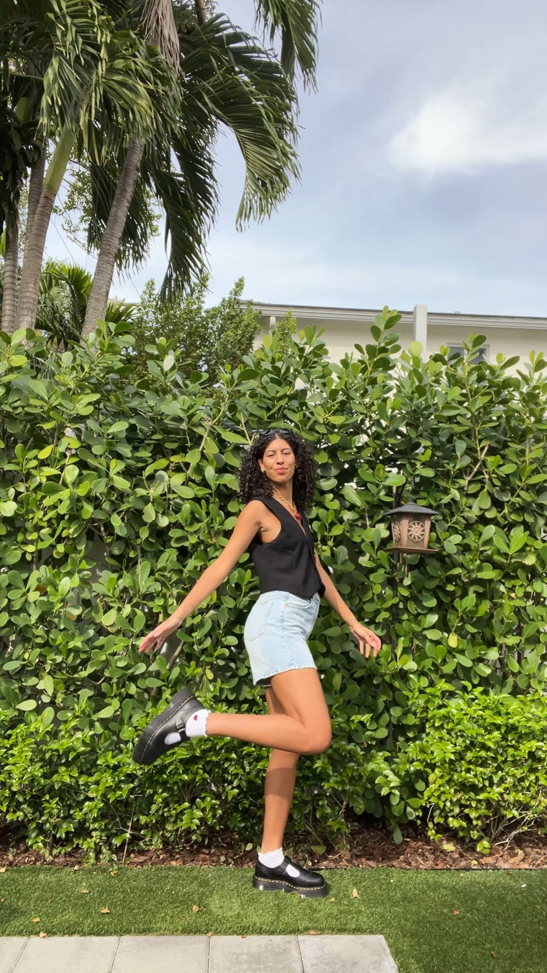 outfit details:
black vest: H&M
shorts: old Zara 
shoes: dr. Marten / doc martens platform Mary Jane’s
Sunglasses: Prada
Necklace: sc collection 