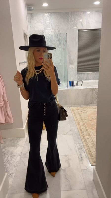 Easy black on black outfit black flare jeans black basic tee LOVE these t-shirts black wide brim hat womens booties gold jewelry stacked necklaces easy outfit ideas affordable outfits 

#LTKstyletip #LTKfindsunder50 #LTKSeasonal