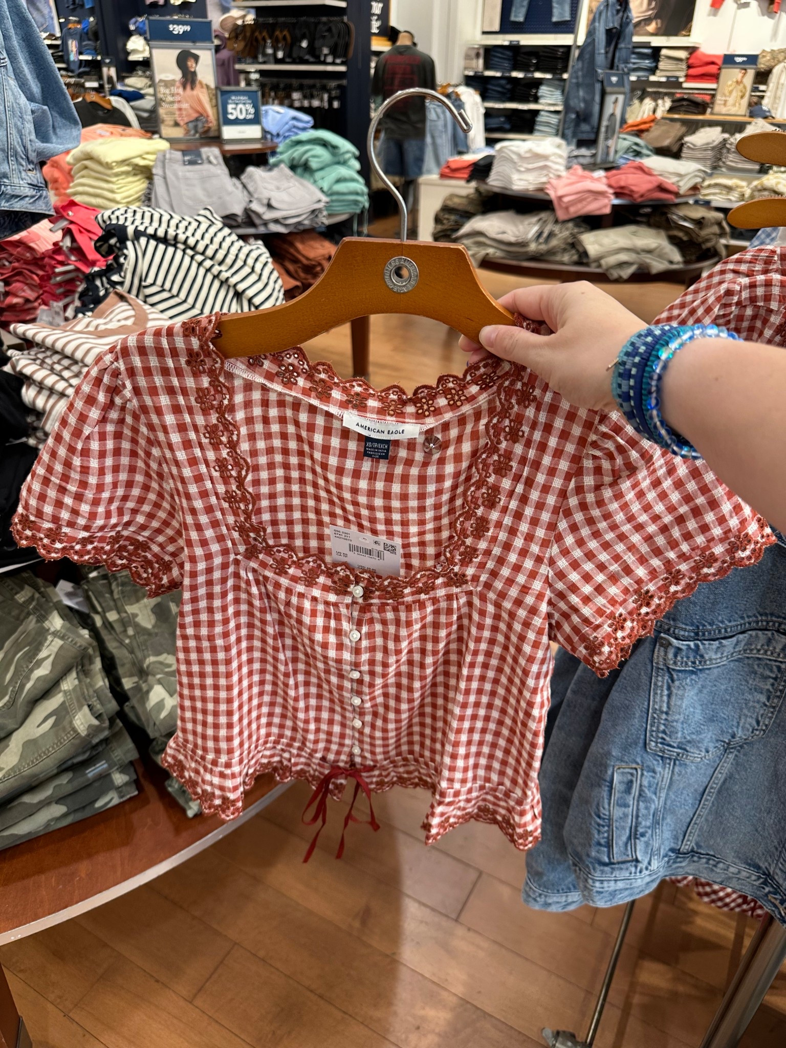 Love this red short sleeve gingham top! So adorable! Would be so cute for a country concert! Perfect for spring! On sale for $37 & ranges from sizes XXS-XXL!

#LTKSpringSale #LTKSaleAlert #LTKMidsize