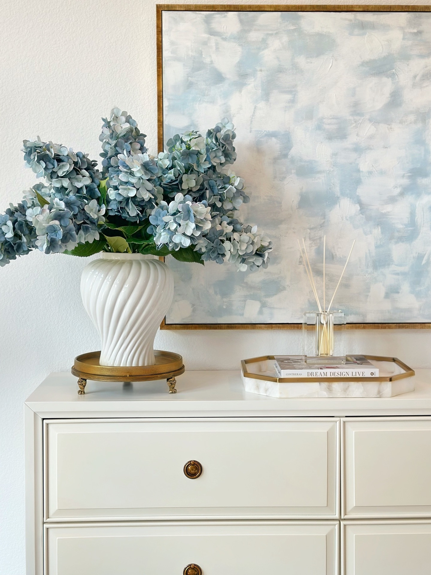 Comment SHOP for links! It finally happened—my oversized clawfoot trays are back in stock after 3 years! 🎉 They come in a set of 2, and the larger one makes the perfect entertaining tray for styling drinkware. I used a touch of gold Rub ’n Buff to warm up the color, and it gave the prettiest finish. 🤩 Swipe for some more entertaining favorites perfect for fall & the holiday hosting!✨ 

#falldecor #fallstyling #homedecor #falldecorations #liketkit #homedesign #ltksalealert #ltkhome #bluehydrangea blue and white decor gold tray #tjmaxx #wayfair #targetdecor #targethome #walmarthome