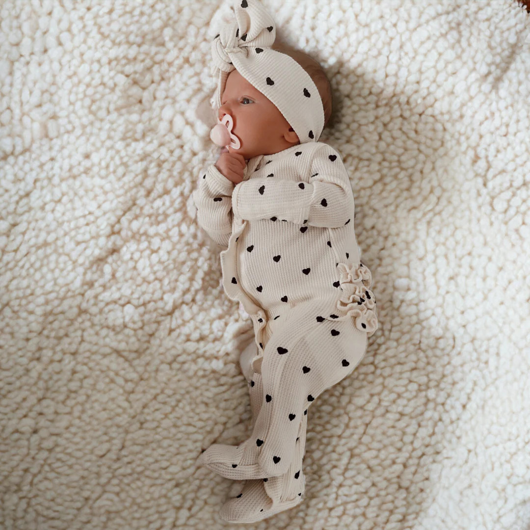 Organic Waffle Ruffle Zip Footie, Black Heart | SpearmintLOVE