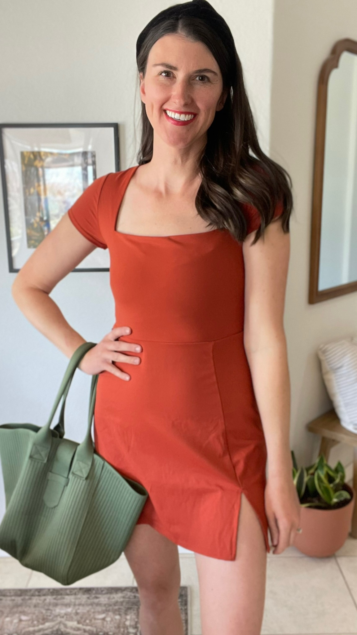 Form fitting athleisure tennis dress. Square neckline, a-like waist. Slit on left thigh. Wearing brick red in medium. 

#LTKFindsUnder50 #LTKActive #LTKOver40
