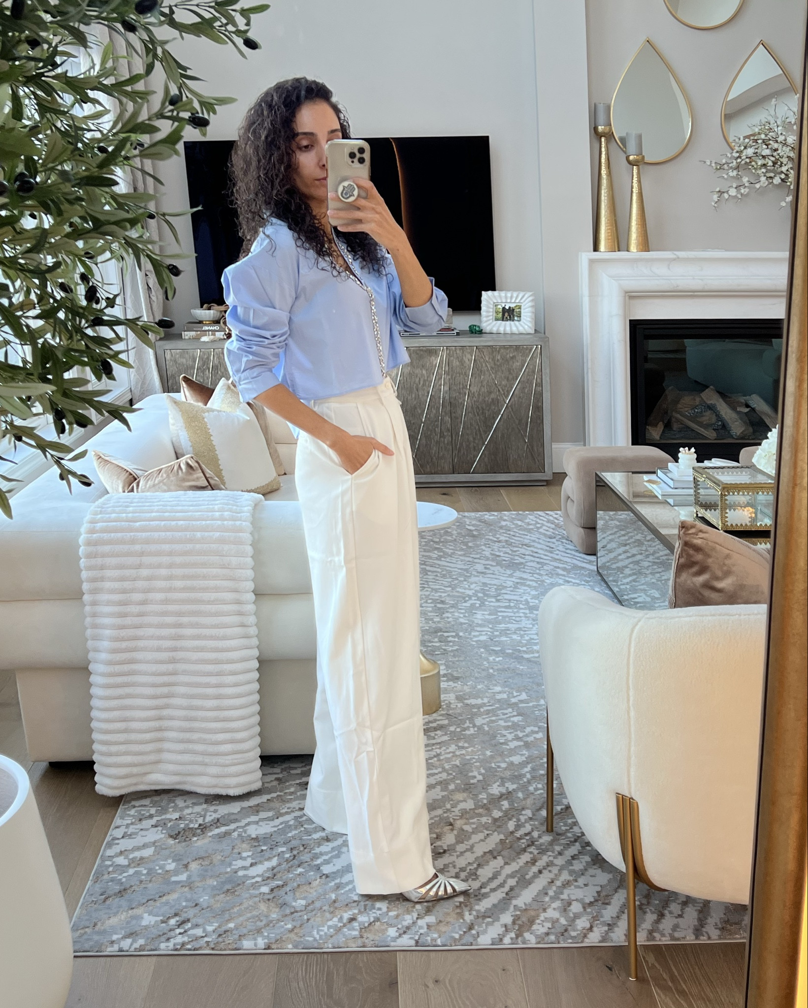 This beaded crop top is the ultimate closet must have. I ordered mine in small. The jeans are a flare jeans that fit nicely! I ordered a size 2 Long so I can wear it with heels for the perfect length. 