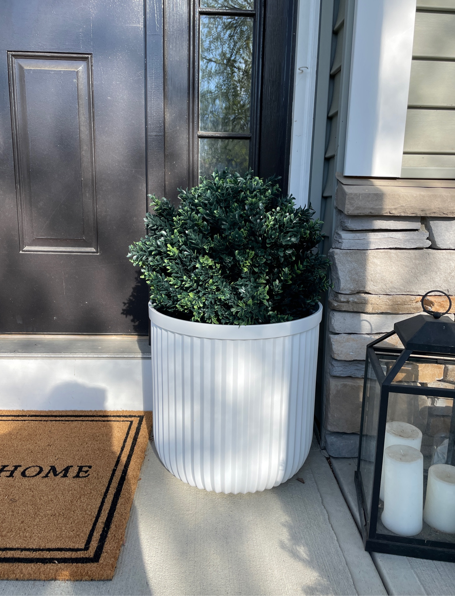 Amazon boxwoods, Walmart planters, Target doormat: front porch decor on a budget! 

#LTKSeasonal #LTKhome #LTKunder50