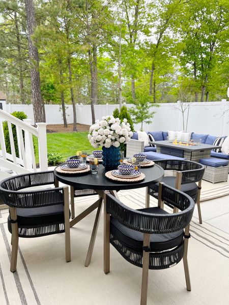 Dining out until further notice! 😁 Dress up and reset my patio with me for Spring with @walmart budget friendly, trendy and modern outdoor furnishings!#walmarthome #walmartpartner 

Outdoor furniture 
Outdoor dining set
Outdoor dining table 
Outdoor dining chairs 
Patio furniture 
Outdoor rugs
Outdoor fringe umbrella 
Outdoor firepit 
Concrete planters 
Blue dinnerware 
Colorful outdoors 
Mother’s Day gift 
Spring refresh 
Summer decor 
Spring decor 

#LTKGiftGuide #LTKSeasonal #LTKhome