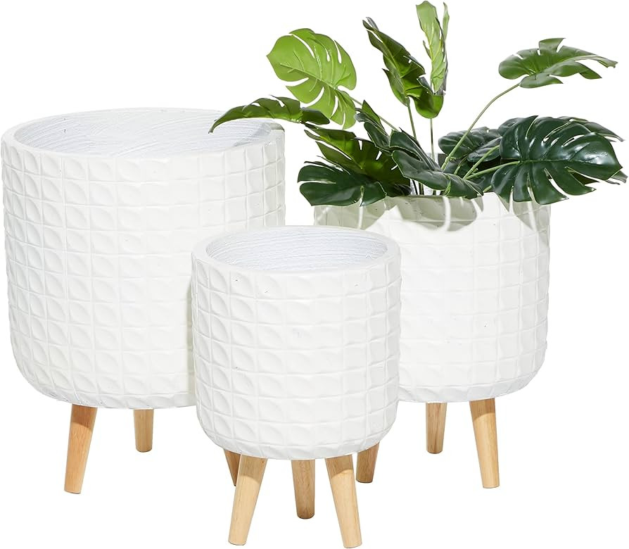 CosmoLiving by Cosmopolitan Magnesium Oxide Round Planter with Wood Legs, Set of 3 18", 16", 14"H... | Amazon (US)