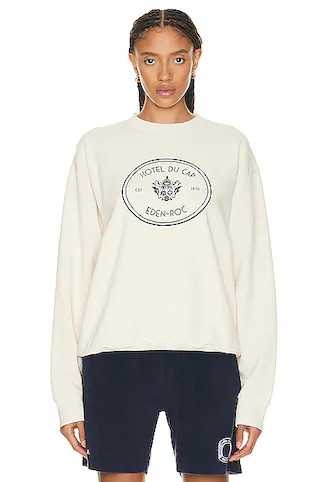 Sporty & Rich X Hotel Du Cap Eden Roc Eden Crest Crewneck Sweater in Cream & Navy | FWRD | FWRD 