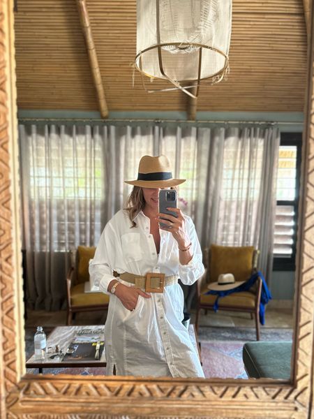 Oh, me? I’m doing just fine.

Accessories make the outfit! So add the belt, hat, summer earrings, and make that white button up dress feel like your on vacation. 