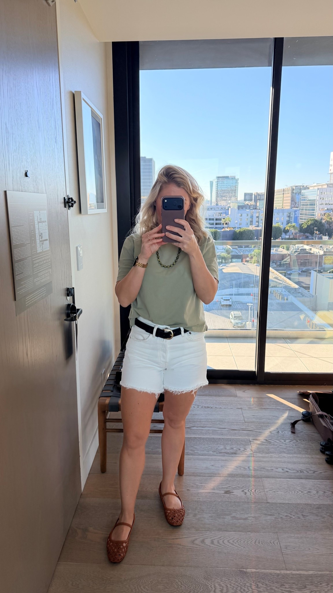 OOTD ☀️
Warm day sightseeing in Beverly Hills and Hollywood. Kept it casual with light layers and breathable pieces — comfort is key when exploring the city!

Outfit Details:
• Tee: J.Crew (similar linked)
• Shorts: AGOLDE
• Belt: Suede belt
• Flats: Woven mesh Mary Janes
• Necklace: Beaded statement piece

#OOTD #LTKTravel #LTKStyle #LTKUnder100 #SightseeingStyle #CaliforniaVibes #BeverlyHillsStyle #NeutralOutfit #CasualChic #LTKOutfit

#LTKStyleTip #LTKShoeCrush #LTKTravel