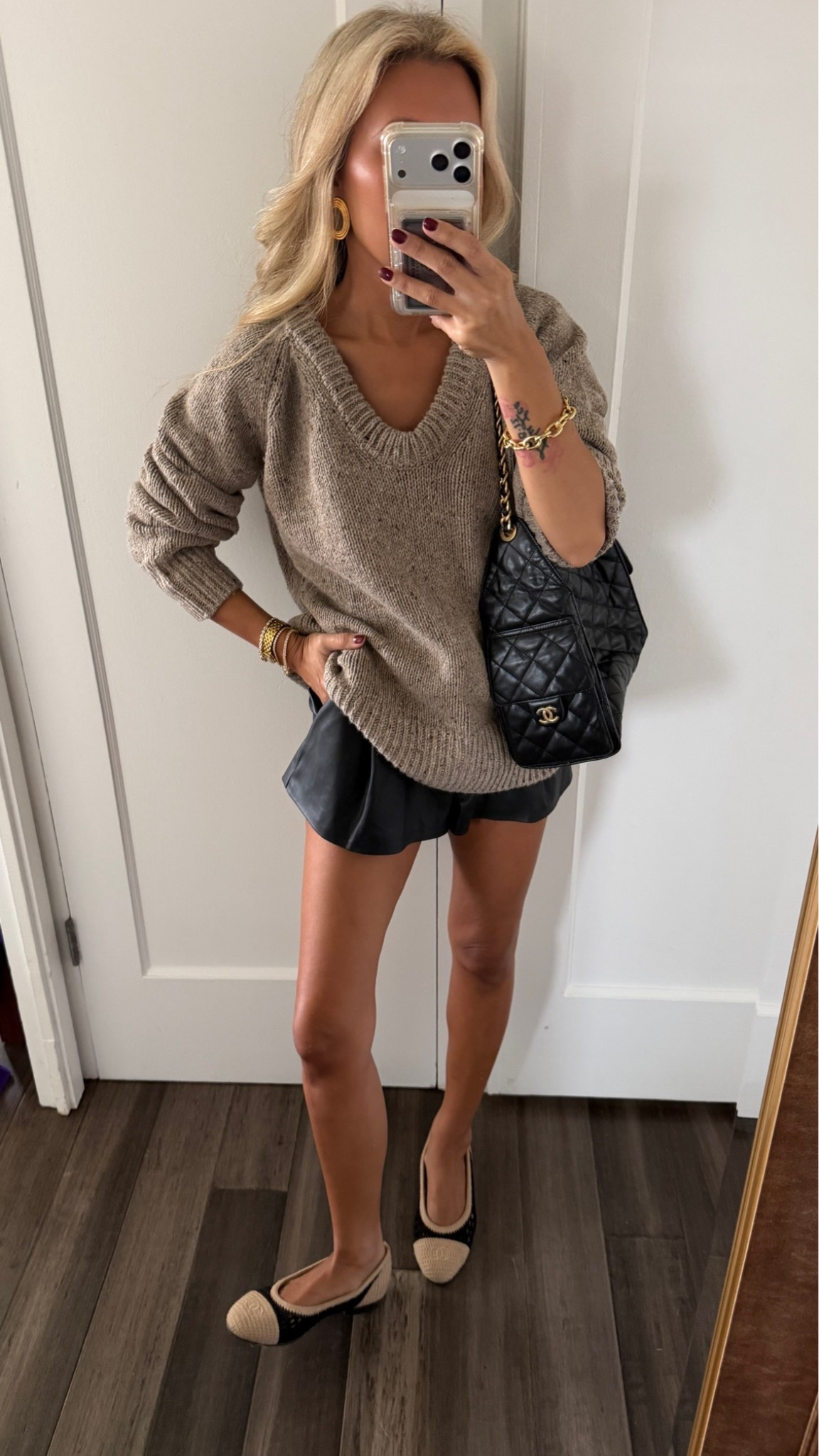The most perfect sweater that looks like THE $400 reformation.. but even better. Chanel flats but linked a very similar one 

Size small sweater, xs pleather shorts.