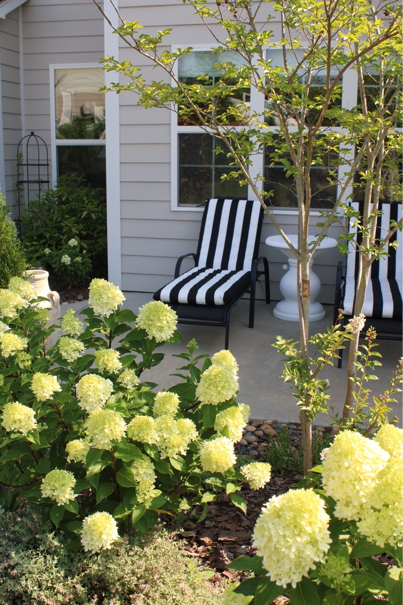 Striped lounge chairs, outdoor lounge chairs, budget friendly lounger, umbrella holder table, obelisk, fountain

#LTKHome