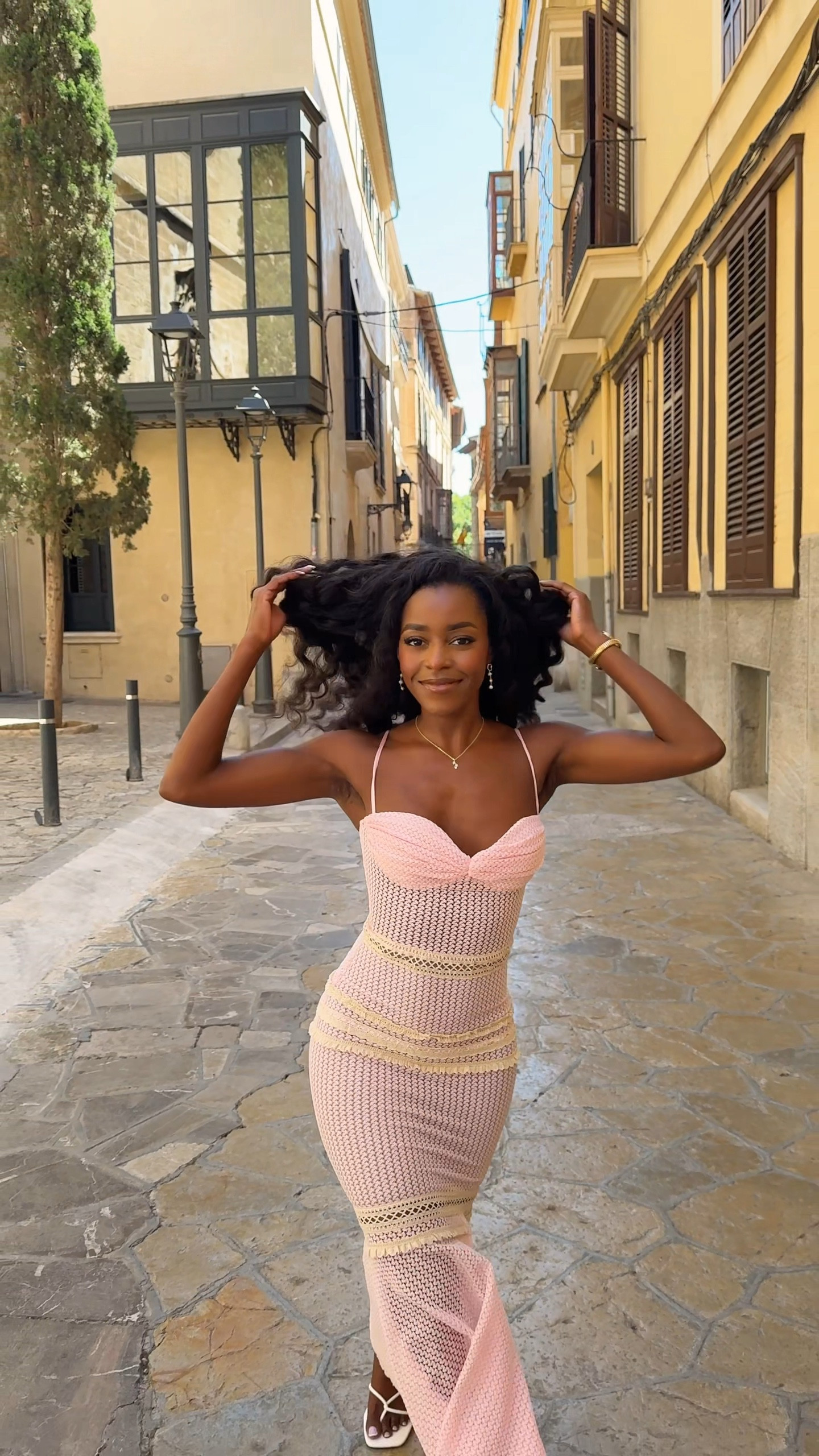 I love pastels! Such cute dresses for the summer 🤭💕 I wore these on vacation during my trip to Spain! Size 0 in the yellow dress, size xxs in the pink. The pink does not stretch #dresses #spain #outfitideas 

#LTKSummerEdit #LTKStyleTip #LTKPetite