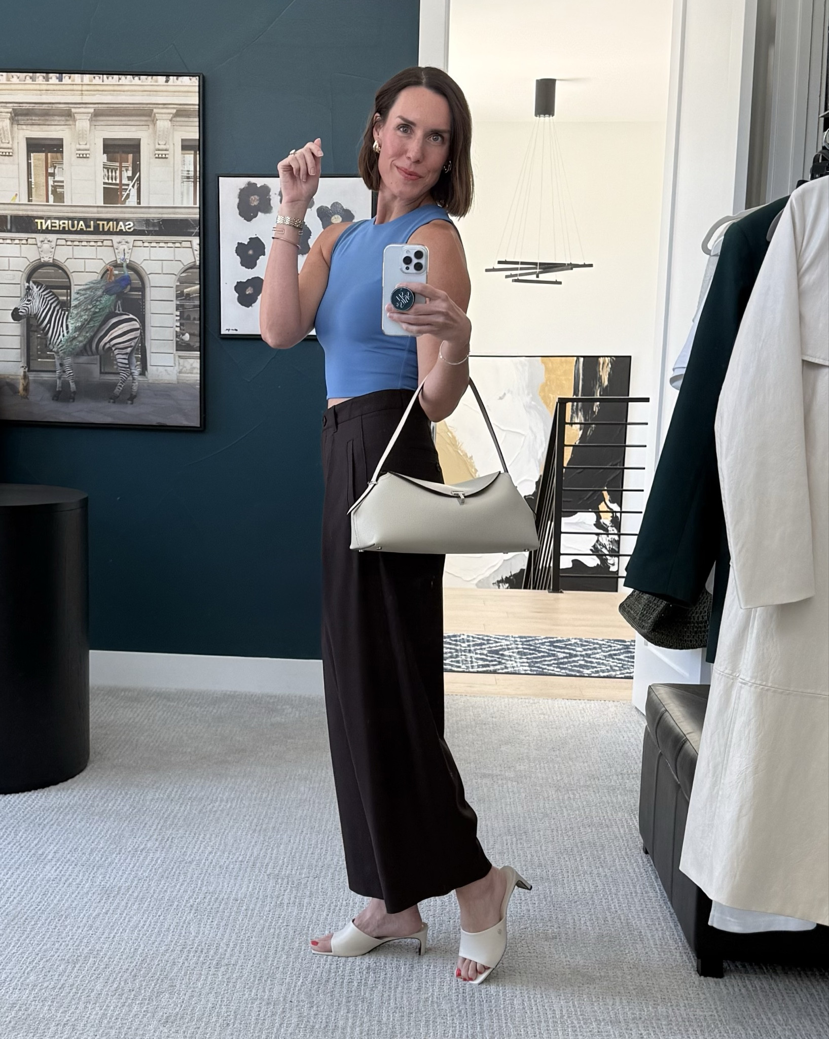 Spring outfit idea! Playing around with the dark brown and blue color combo here. 🤎💙 Ankle trousers, fitted sleeveless top, and optional sweater layer around my shoulders. Little heeled sandal and corresponding handbag. Polished with mixed metal jewelry to complete the outfit. ⚡️

#LTKOver40 #LTKWorkwear #LTKootd