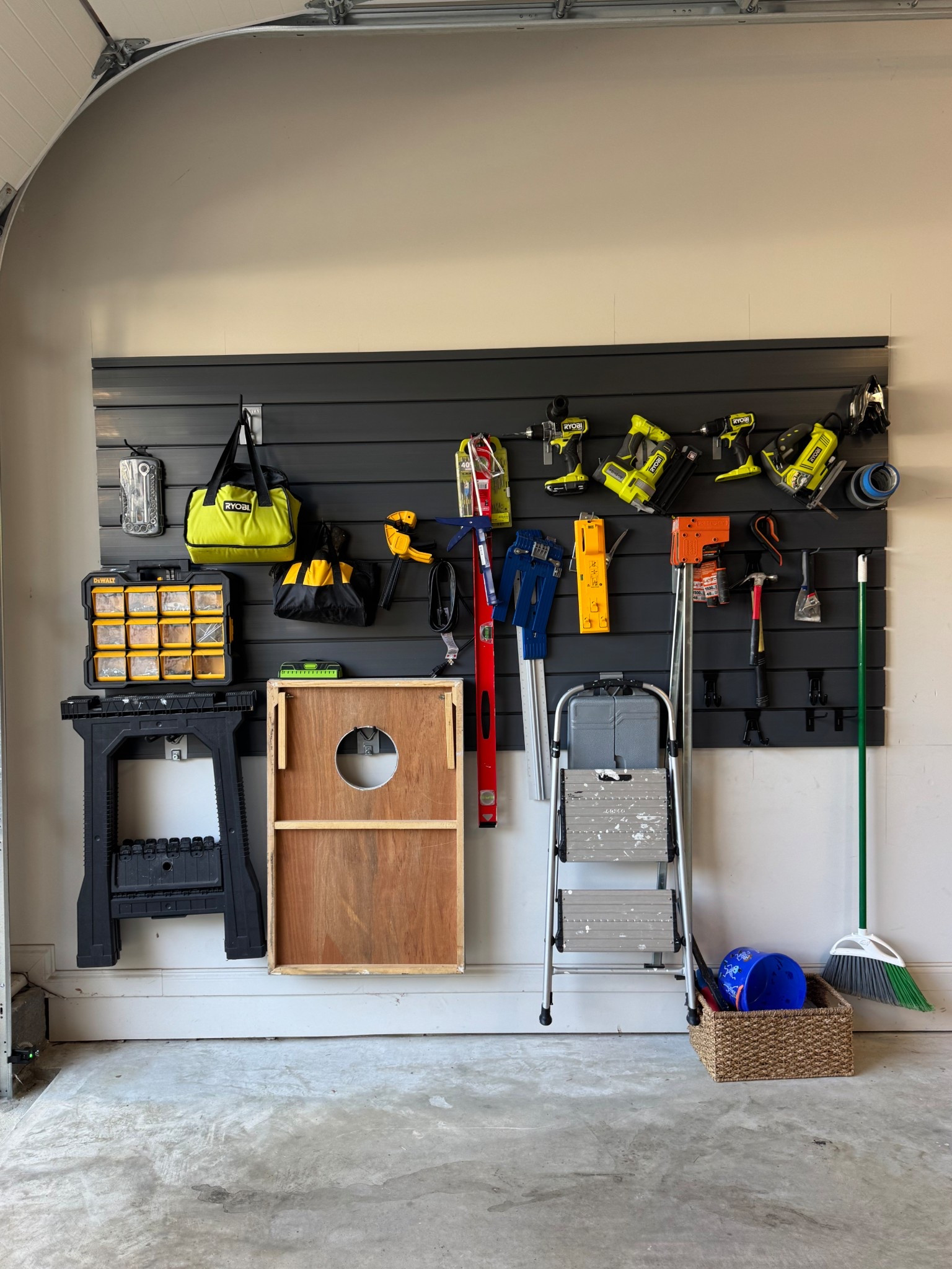 Garage organization using a slatwall and accessories.

#LTKHome #LTKSeasonal