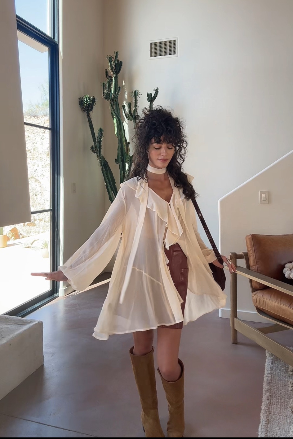 Love how versatile this flowy Free People blouse is. Comes with a little sash so you can tie around your neck for a retro feel or tie around your waist. Looks great with denim too. 

#LTKStyleTip #LTKFindsUnder100 #LTKSeasonal