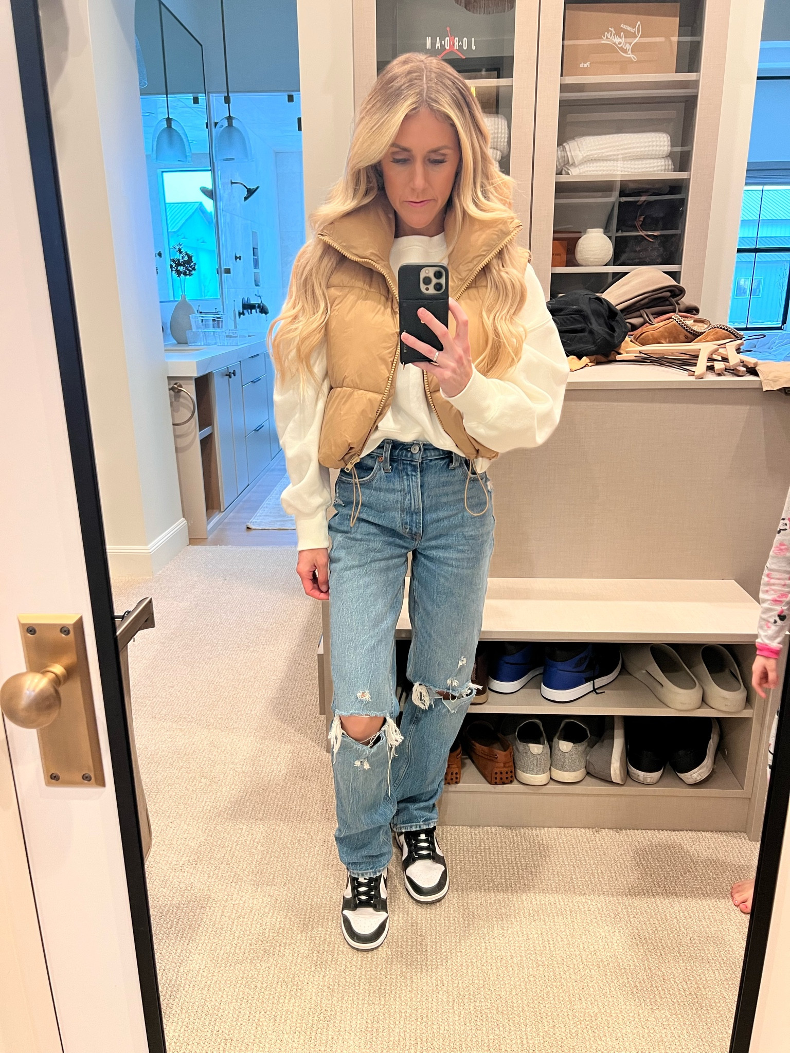 Amazon vest 
It is short so I sized up to a medium 
Nike sweatshirt 
Oversized fit I’m wearing XS 
Nike Dunks 
TTS I’m wearing size 7 
Abercrombie jeans 
TTS I’m wearing 24, regular length 

#LTKfit #LTKFind #LTKunder100