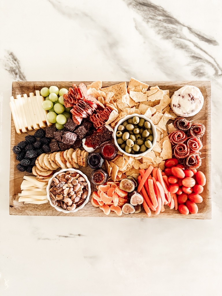 This laser cut charcuterie board is the easiest way to create an effortless board! #charcuterie #easyentertaining

#LTKfoodie #LTKHome #LTKWedding
