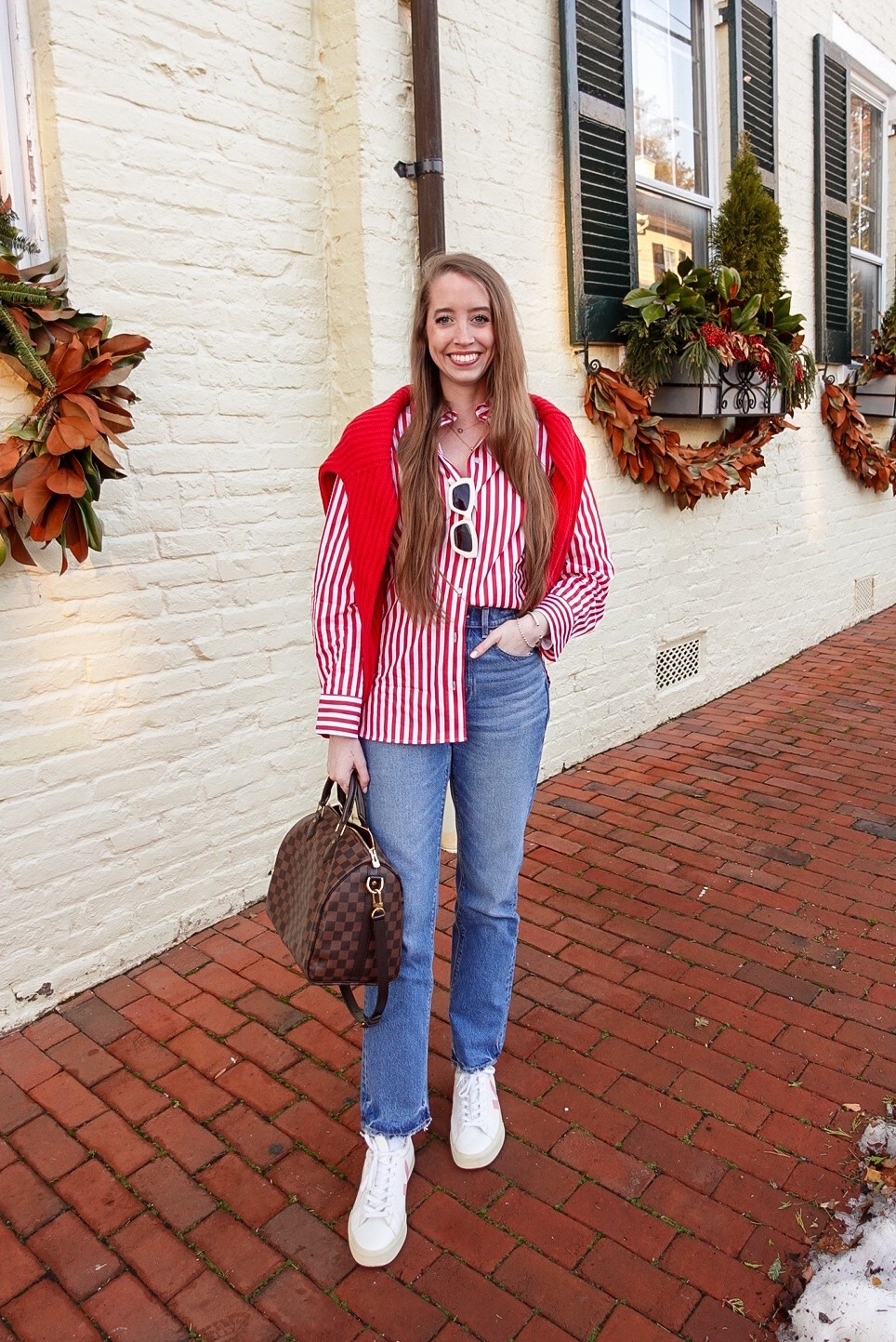Casual preppy spring outfit - shirt is oversized (in an XS) but everything else is true to size! Wearing size 2 in the jeans 

 red and white striped shirt / white sneakers / red sweater 

#LTKStyleTip #LTKFindsUnder50 #LTKSeasonal