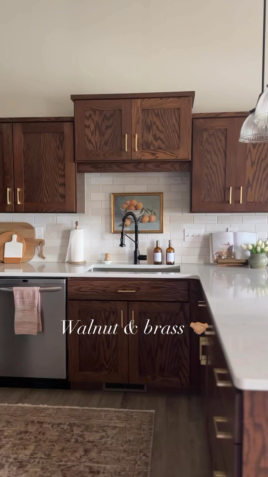 Dark stained cabinets and brass hardware are the best kitchen duo! 

#LTKStyleTip #LTKWatchNow #LTKHome