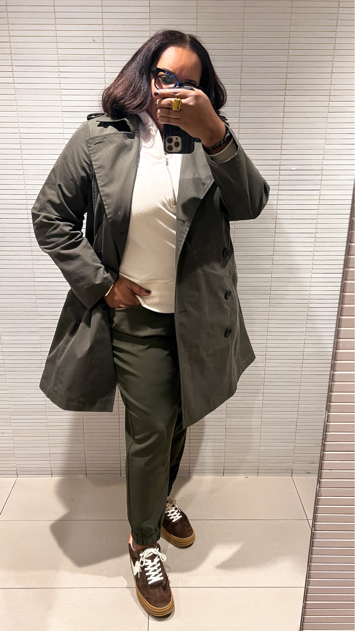 CODE ALERT! The color is Nori and we are having a time! 

OOTD - Universal Standard - Had to be super comfy for PT so these joggers were perfect. Wearing size 16. Derjon Trench Coat comes in 3 colors, I have two because it's so good. Sized up to an 18 to give room for sweaters but it's TTS. 
CODE: INFS-AMBPATRANILA for 10% off at Universal Standard. 
#ltkover40 #ltksalealert #LTKfindsunder100 

#LTKMidsize #LTKSeasonal #LTKStyleTip
