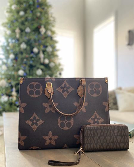 Can you believe this large wannabe LV purse fits everything in my diaper bag and purse and it’s only $30! I had to grab a brown wallet too, 15% off on sale now!

Designer dupe purse. Louis Vuitton dupe. LV dupe. Designer dupe wallet. LV wallet dupe. LV purse dupe. Affordable purse. Affordable wallet. Brown wallet. Large purse. Brown purse.

Walmart. Amazon.

#LTKfindsunder50 #LTKbaby #LTKGiftGuide