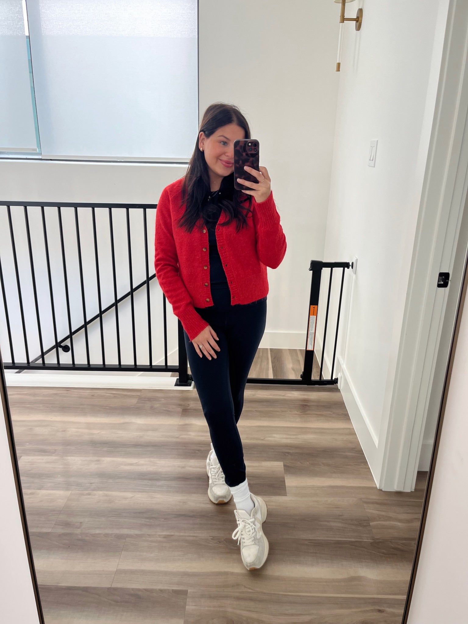 Pair bright red with navy for a classic look ❤️ 

Red cardigan, navy leggings, amazon find, free people, veja sneakers, gold Huggies, casual outfit, holiday cardigan 