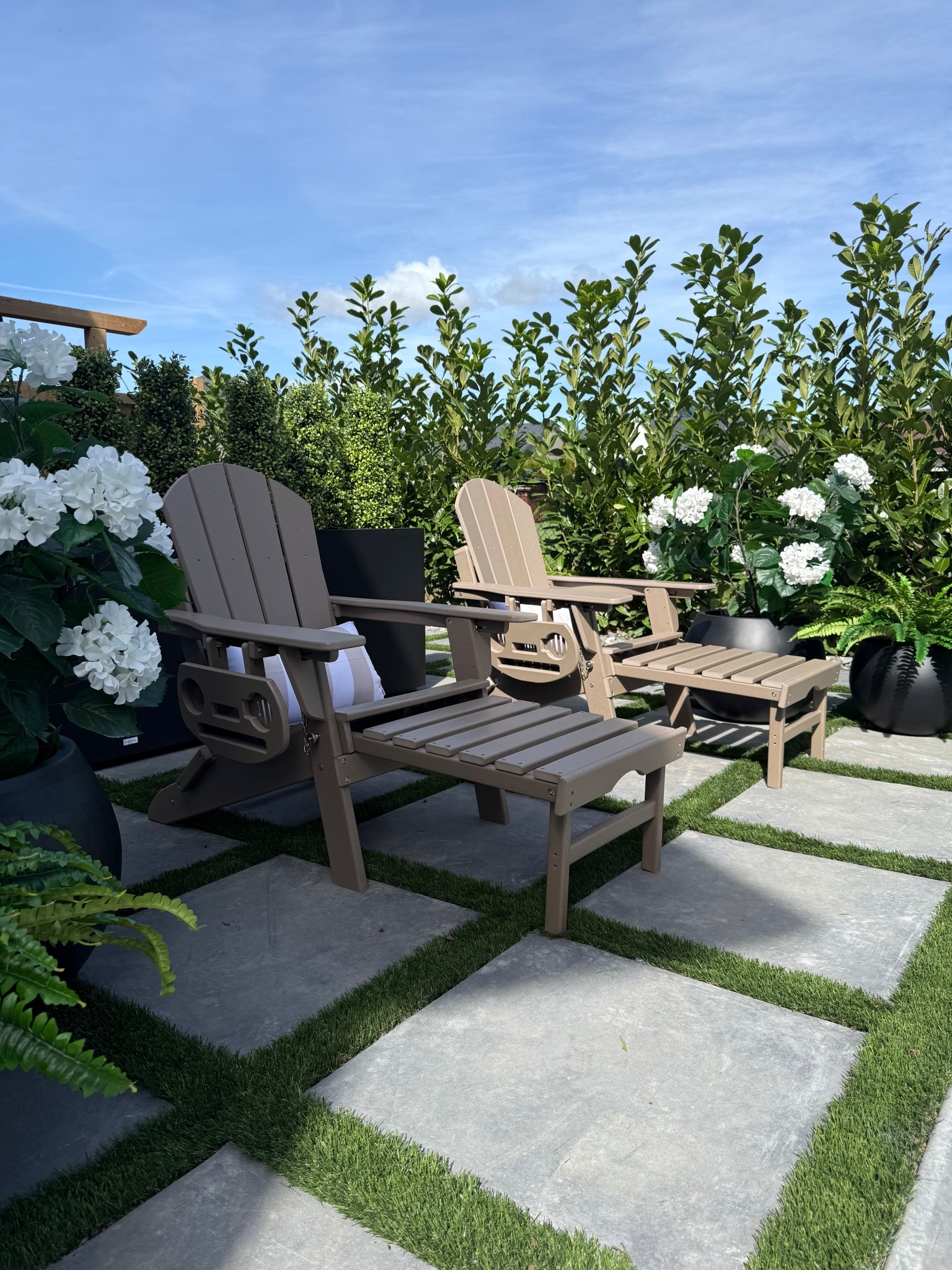 Cozy sitting/lounging area on the pool patio. 
These Adirondack chairs are great.. they recline, have a built in ottoman and cup holder. Sooo comfy! 