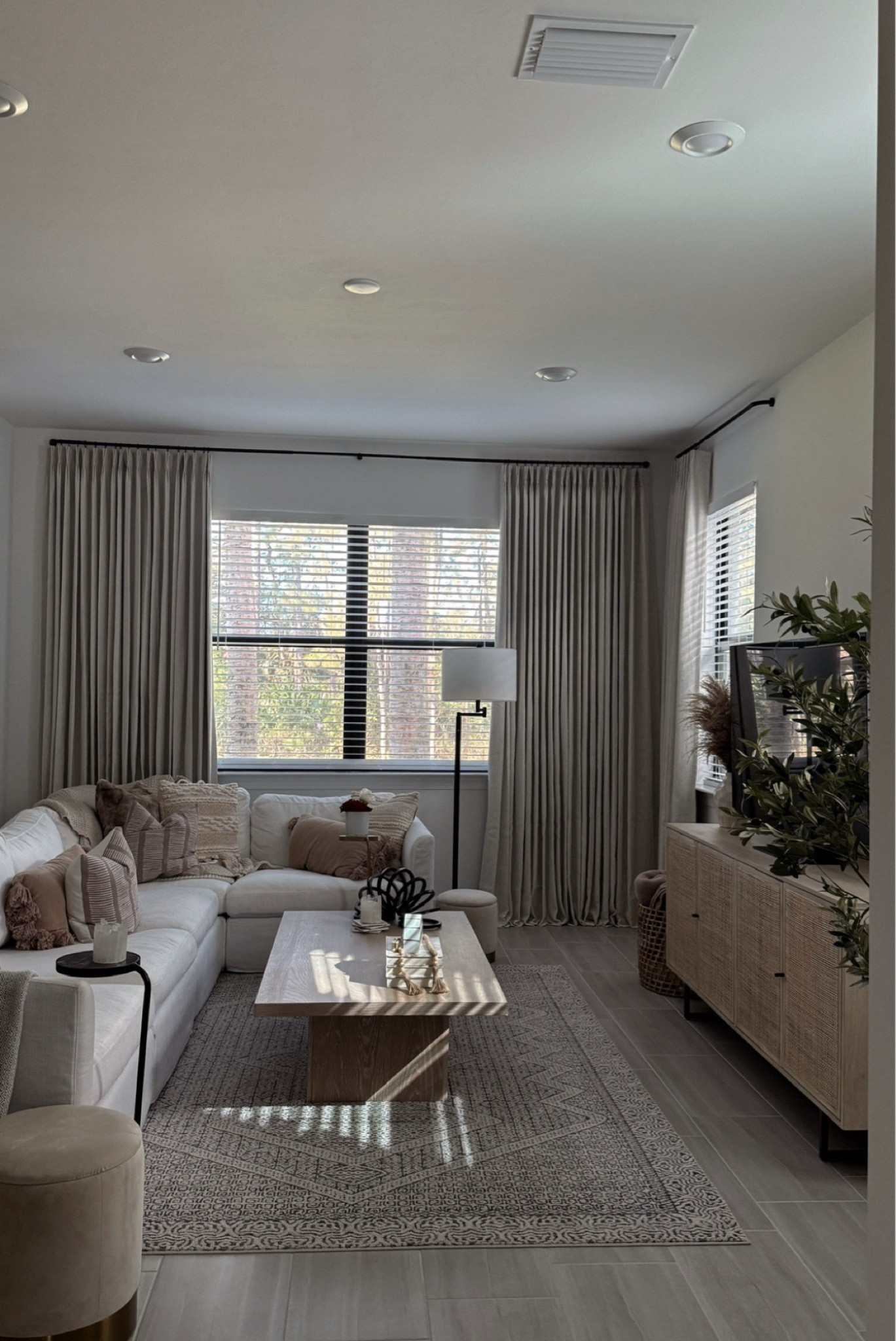 So excited to be back in Naples! 🌴 

Links to my Naples Living Room - these Amazon curtains are so good! Details: Pinch pleat Amazon curtain - the large window has 2 60x108 panels on it, we hung them 4 inches from the ceiling using the curtain rod linked below & 1 inch rings. 

Home decor, modern home, neutral decor, home accents, Amazon home   

#LTKHome #LTKStyleTip