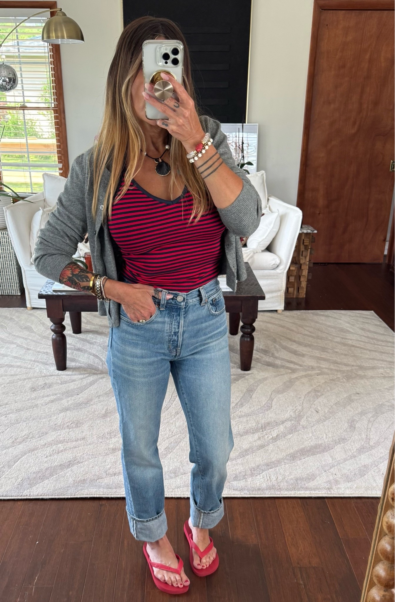 Easy basics that just do the work. I love a red and blue stripe. Halter size small, jeans 25.

#LTKOver40 #LTKPetite