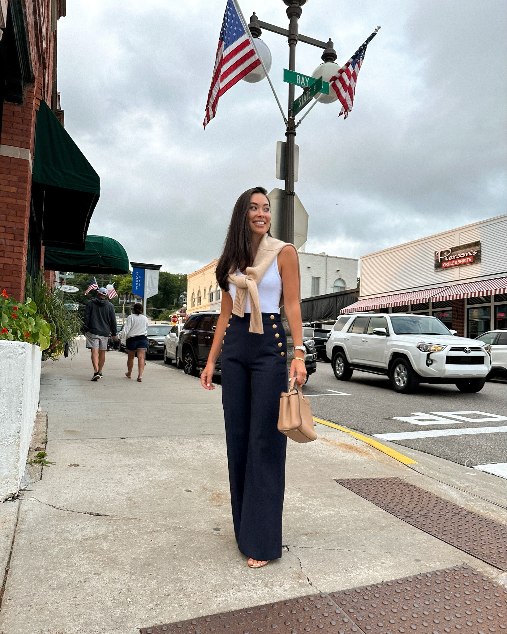 Kat Jamieson wears a white bodysuit, navy blue trouser pants and sweater to dinner. 

Pants run very small, size up.

#LTKworkwear #LTKSeasonal #LTKstyletip