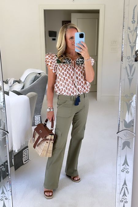 Fall transition look:  
Pair your favorite summer top like this block, print cotton top with shades of rust and green with the perfect cargo pant.


Valentino, brown, leather and rope Roman rock stud wedge sandals 
All fit true to size 
Top is extra small pants are size 25 I am 5‘2“ tall and wearing my typical size 

#LTKstyletip #LTKSeasonal #LTKover40