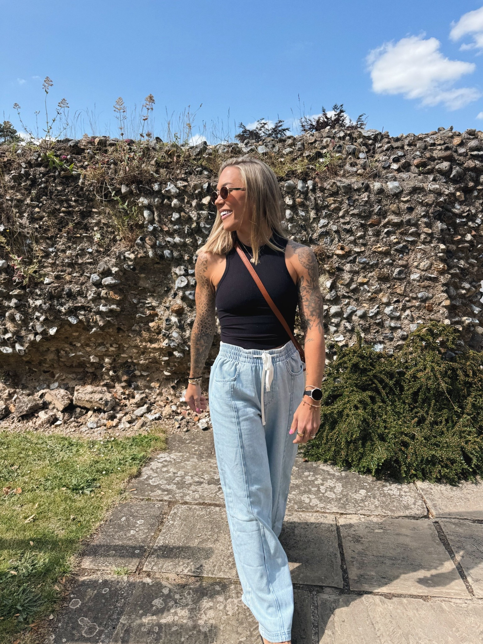 Comfy first OOTD yesterday to explore Bury St. Edmonds 🖤🌼 Vitality tank - S (has a built in bra — super nice) & S in these Target wide leg pants! They resemble sweats to me, super comfy! & my basic flip flops I’ve been loving!  

Vitality code HOLLEY10 will work on my tank top! 😌

Target / vitality / summer style / comfy / casual style / travel fit / Holley Gabrielle 

#LTKStyleTip #LTKFindsUnder100 #LTKFindsUnder50