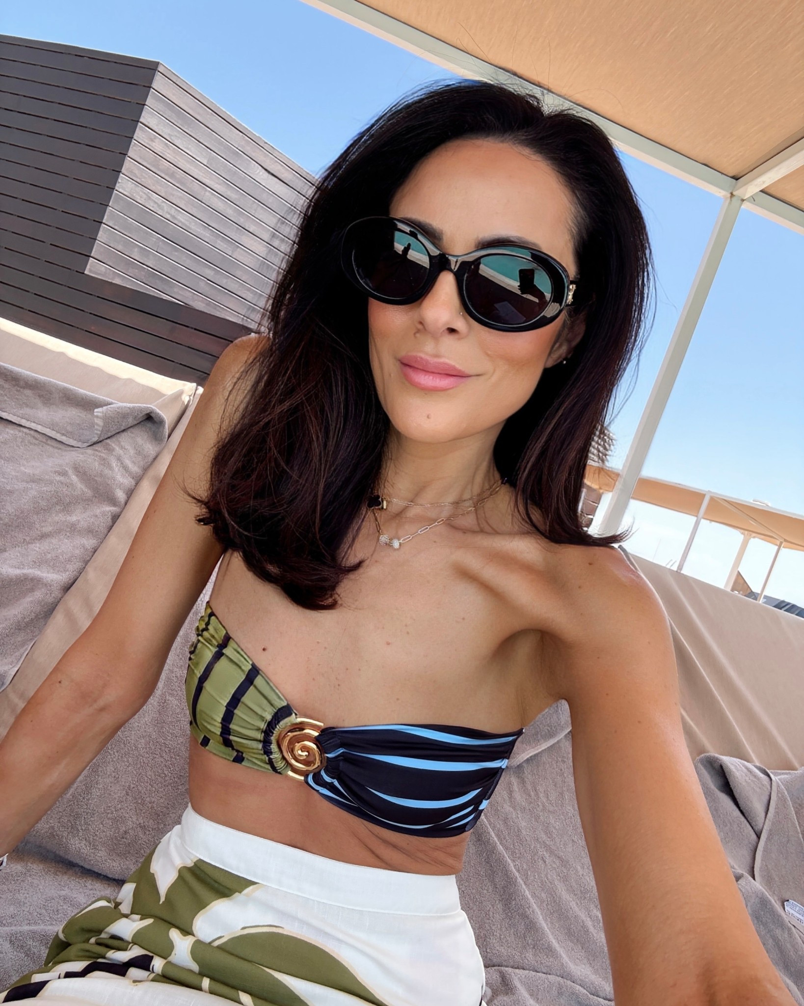 Pool day in the city escaping the heat for our hotels rooftop pool for the day!
XS top and bottom and skirt! Use Code: WHIMS20 

#LTKSaleAlert #LTKOver40 #LTKSeasonal