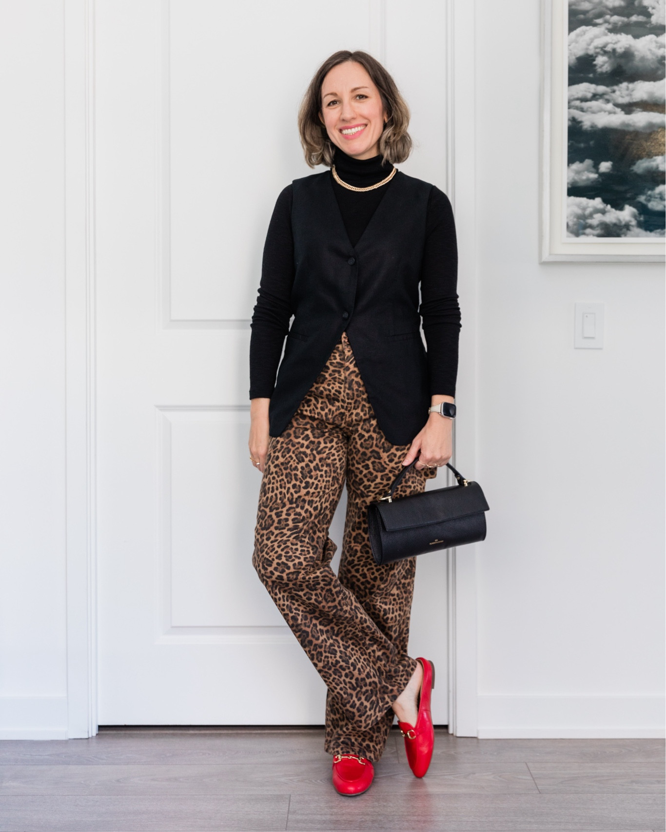 Leopard print pants outfit with black vest and turtleneck for fall 

#LTKOver40 #LTKSeasonal