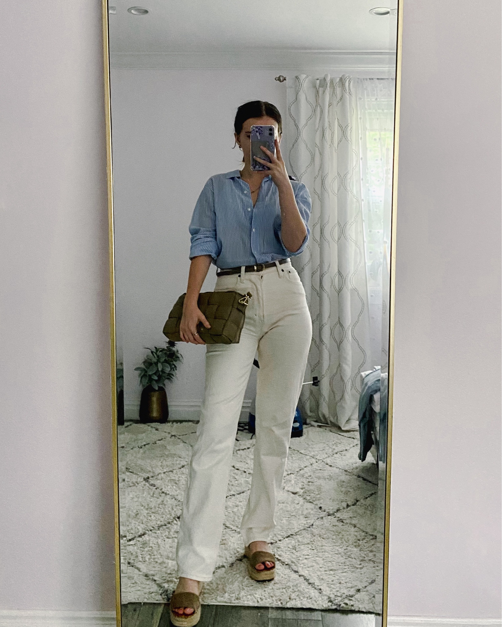 A poplin shirt paired with white jeans, wedge sandals and a hand bag makes a classic spring outfit idea. 
.
.
.
.
.
.
Spring outfits | button down shirt | button up shirt | striped button down | linen button down | spring work outfits | spring shoes | jeans outfit | white denim jeans | straight leg jeans outfit | white jeans outfit | high rise jeans | cream jeans | sandals 2024 | summer sandals | wedge sandals | espadrille sandals | brown sandals 
#LTKxMadewell 
#LTKGiftGuide #LTKSeasonal #LTKFind #LTKunder50 #LTKunder100 #LTKU #LTKsalealert #LTKfindsunder50 #LTKfindsunder100 #LTKstyletip #LTKworkwear #LTKtravel #LTKshoecrush #LTKitbag #LTKparties