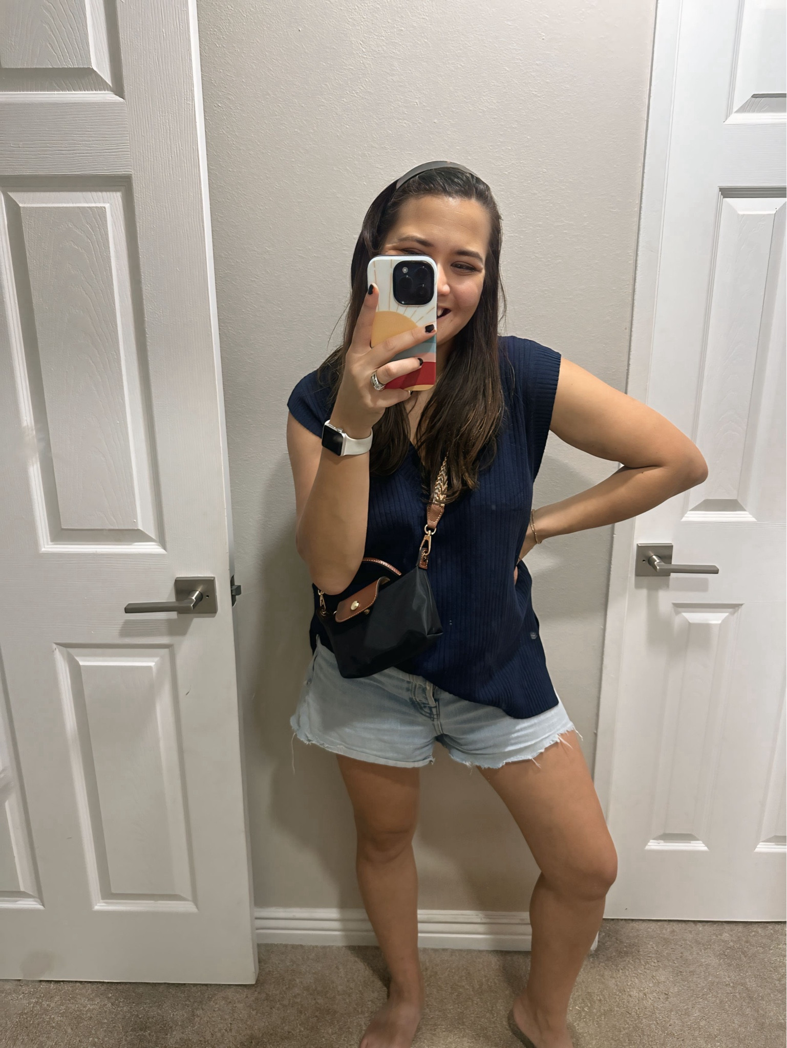 Early fall summer transition outfit 

Headband kitsch 
Sweater vest Amazon 
Bag Longchamp for less Amazon 
Shorts madewell 

#LTKStyleTip #LTKItBag #LTKFindsUnder50