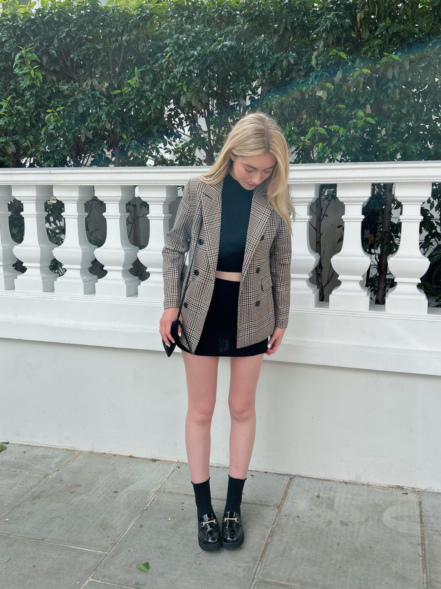 The perfect black mini skirt outfit. Style inspo for date night, night out, work, or an event. I wore this outfit for my trip to London! #travel #londonstyle

#LTKeurope #LTKstyletip #LTKtravel