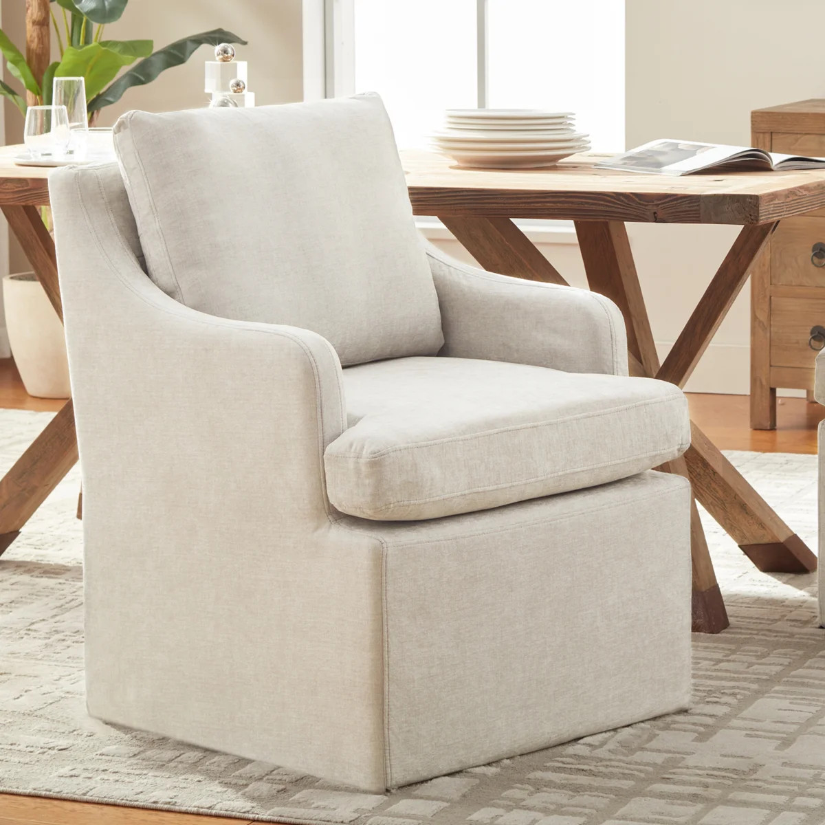 Ensor Tufted Fabric Dining Chair with Casters | Wayfair North America