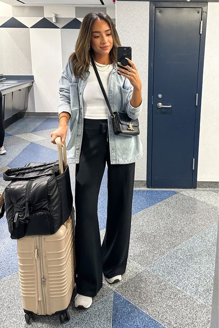 Airport outfit ✈️ comfiest travel outfit ever. The pants are SO soft and the denim shirt jacket is sweatshirt material 🤤 code NENAXSPANX to save 10% and free shipping on pants! Size Small Tall in wide leg lounge pants and Small in denim shirt jacket 

#LTKunder100 #LTKtravel #LTKstyletip